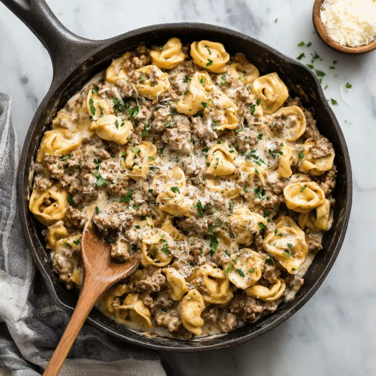 creamy one-skillet beef stroganoff tortellini in a cast iron skillet