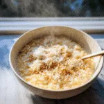 Creamy TikTok pastina recipe in a bowl with parmesan and butter